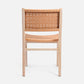 Chair with woven backrest and seat on a white background