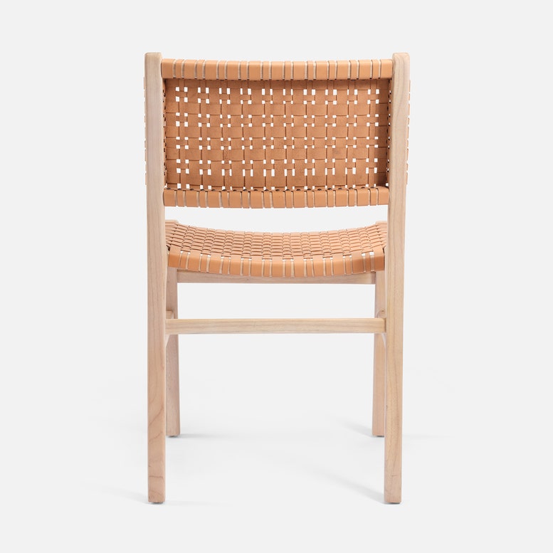 Chair with woven backrest and seat on a white background
