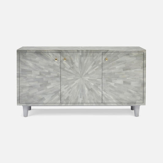 A modern three-door sideboard cabinet featuring a light gray and white fish-scale or bone inlay pattern with a sunburst design on the center door, small gold knobs, and tapered light gray legs, shown against a plain light gray background.