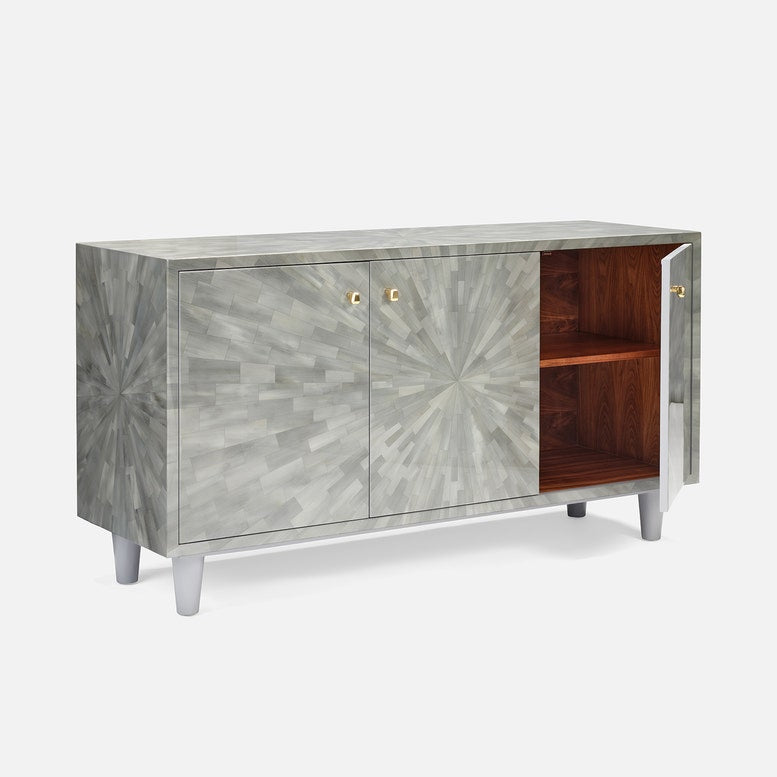Wooden cabinet with starburst pattern on doors against a white background