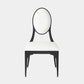 A modern dining chair with a black metal frame and a white upholstered seat and oval backrest, shown against a light gray background.