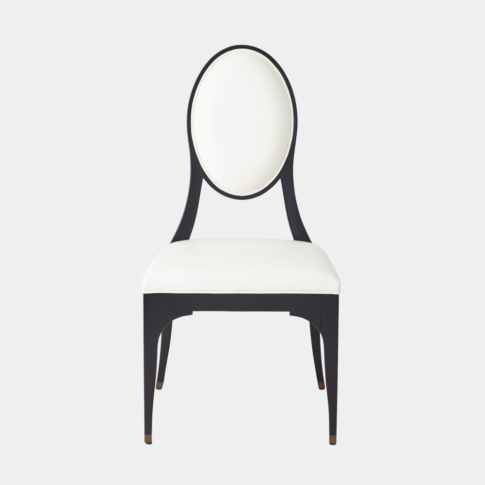 A modern dining chair with a black metal frame and a white upholstered seat and oval backrest, shown against a light gray background.