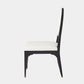 Black chair with white cushion on a white background