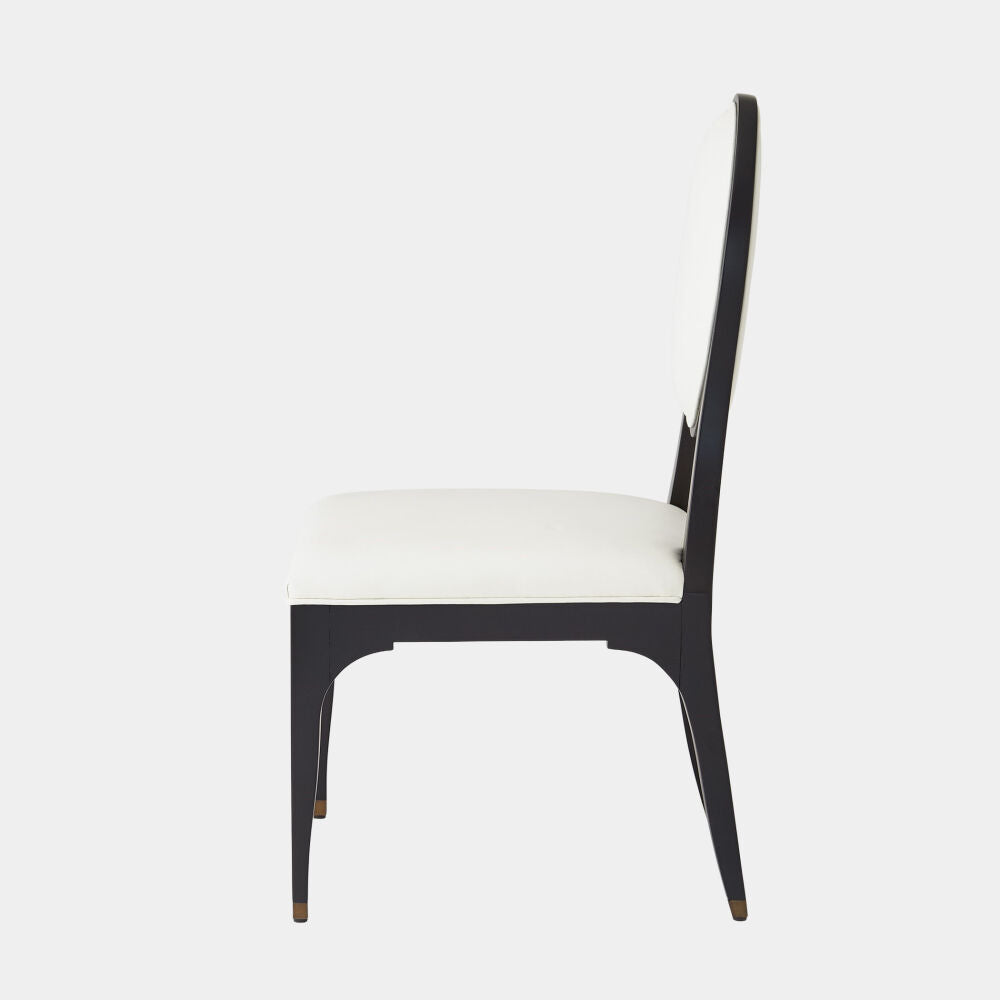 Black chair with white cushion on a white background