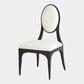 Chair with black frame and white cushion on a light gray background
