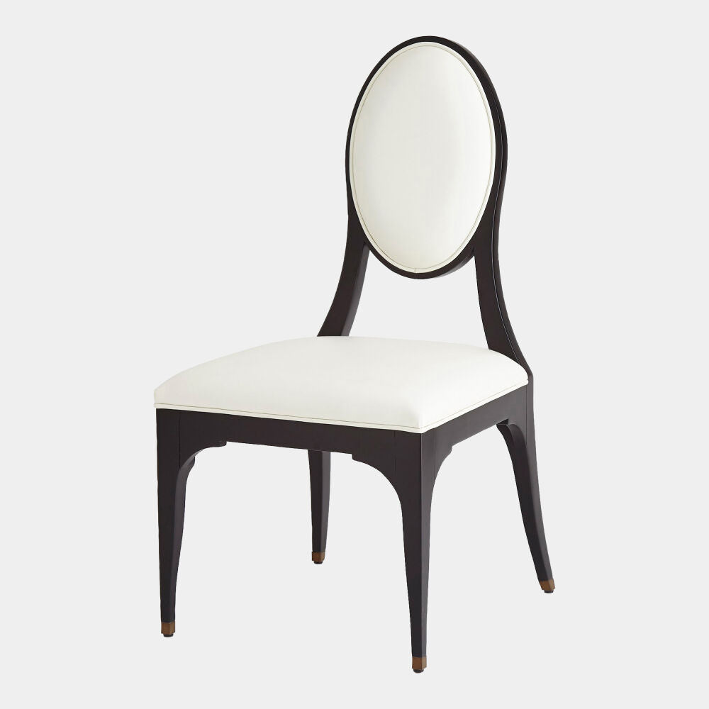 Chair with black frame and white cushion on a light gray background