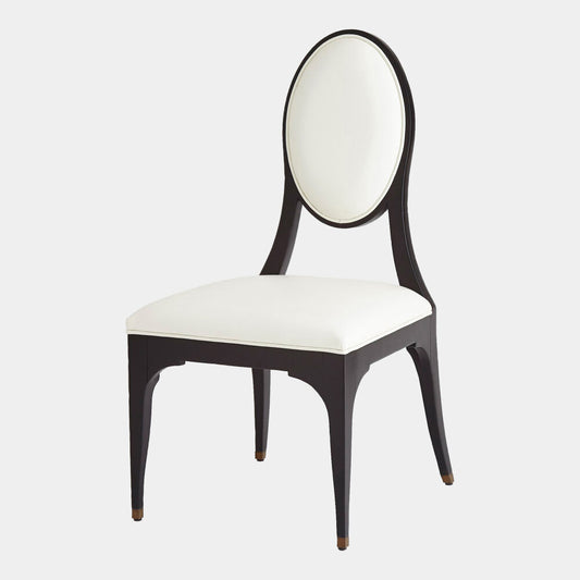 Chair with black frame and white cushion on a light gray background
