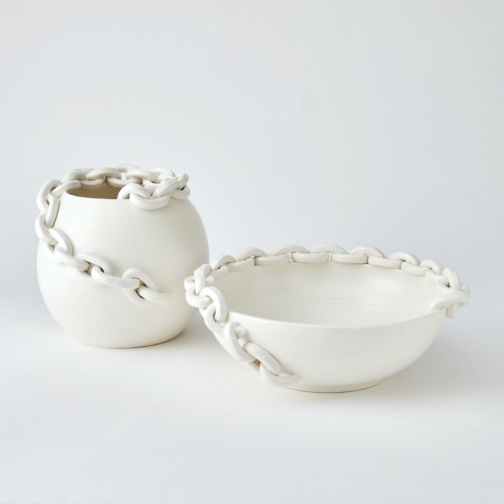 Two ceramic pots with chain-like designs on a white background