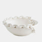 White ceramic bowl with chain design on a white background