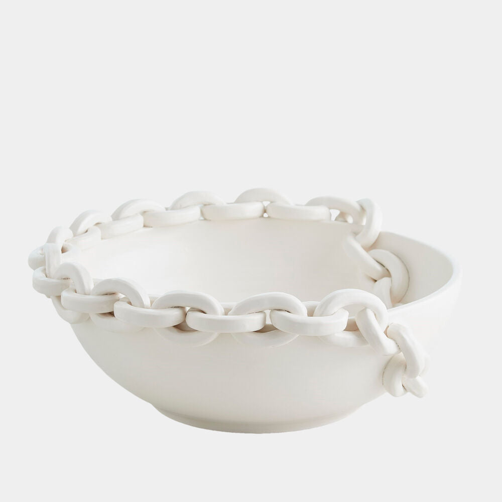 White ceramic bowl with chain design on a white background
