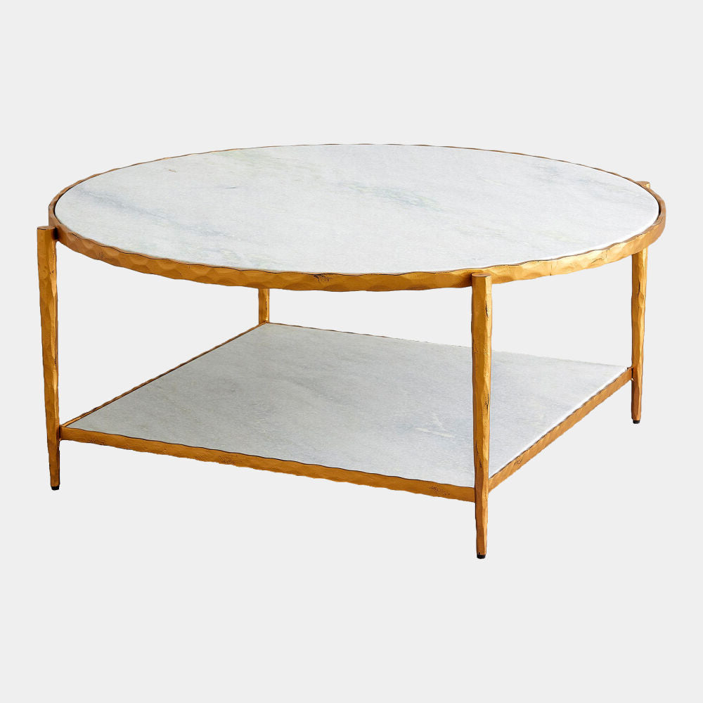 Round coffee table with gold frame and white marble top and shelf on a light gray background