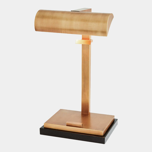 Gold jewelry stand on a white background