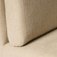 Close-up of a textured beige fabric surface