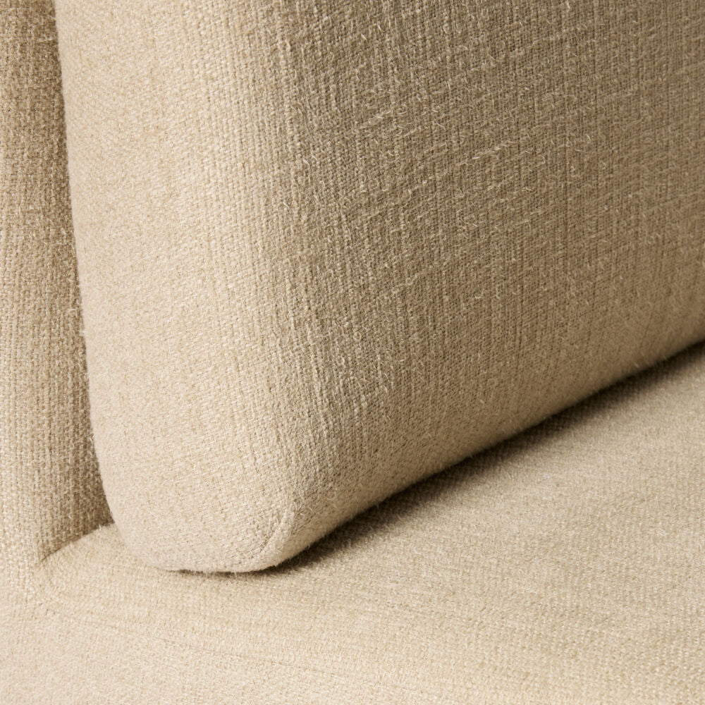 Close-up of a textured beige fabric surface