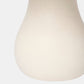 Close-up of a beige ceramic vase on a white background