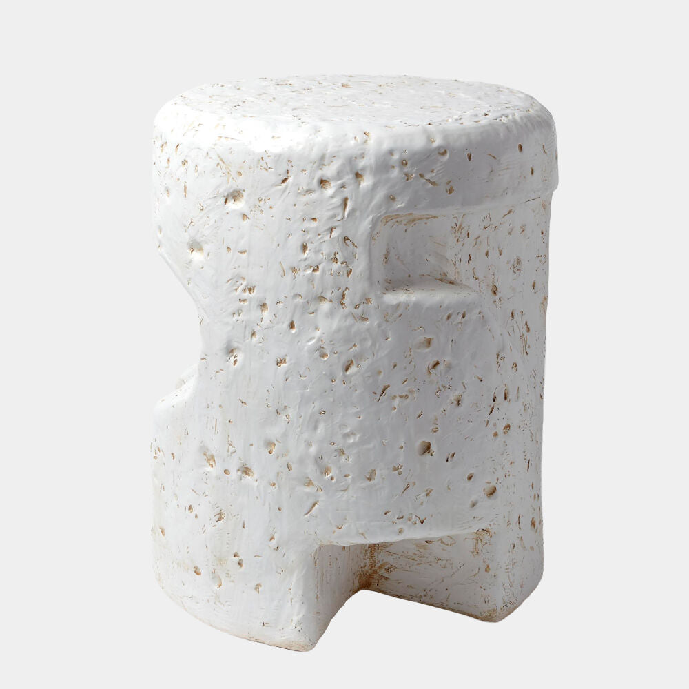 White ceramic side table a light gray background