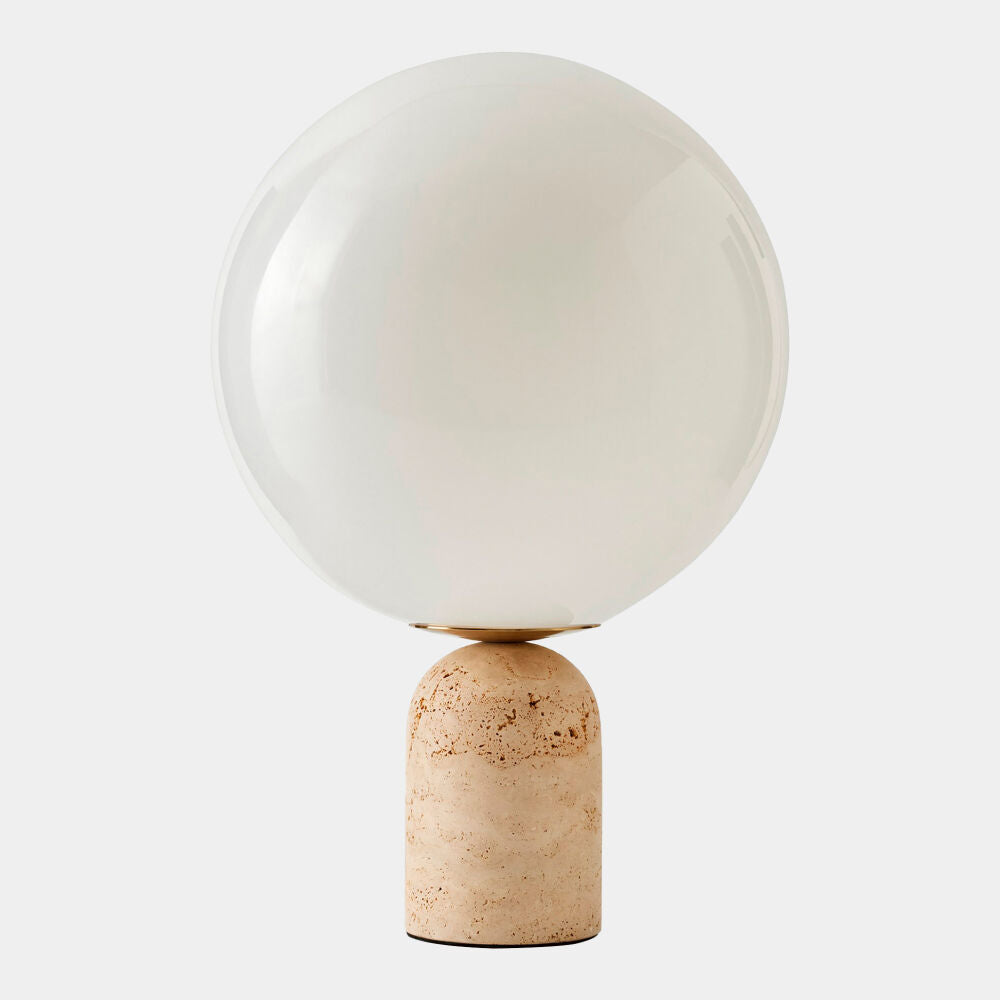Table lamp with a spherical white shade and terracotta base on a light gray background
