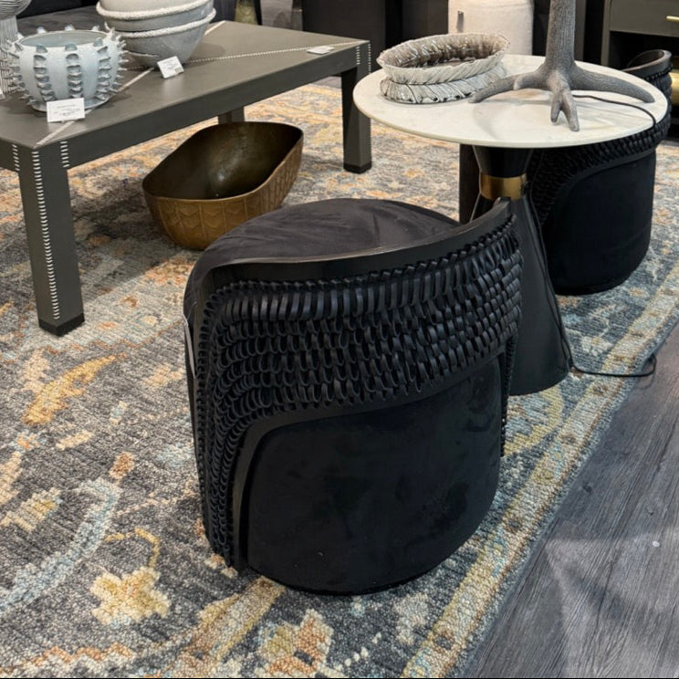 Modern interior design showroom with furniture and decor items.