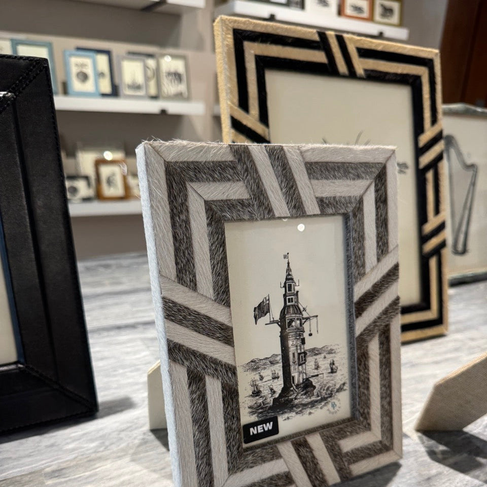 Decorative photo frame with geometric pattern on a marble surface