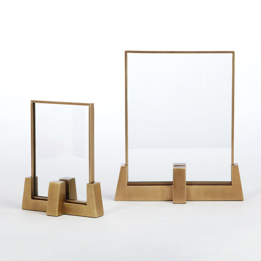 Two gold photo frames on a white background