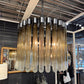 Chandelier with glass tubes in a modern interior setting