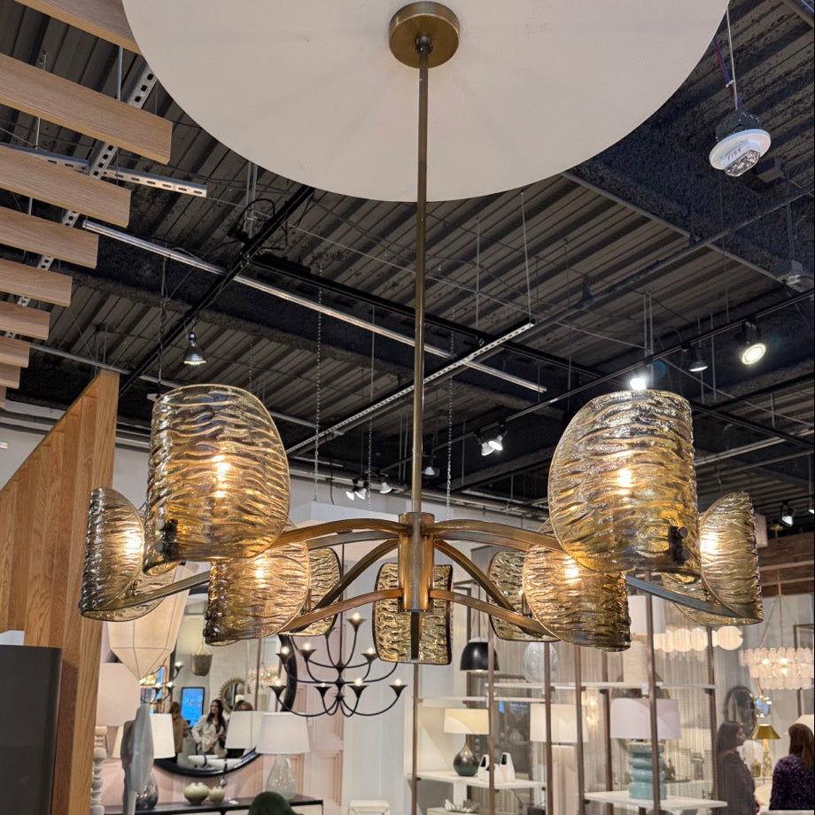 Modern interior design showroom with chandeliers and furniture