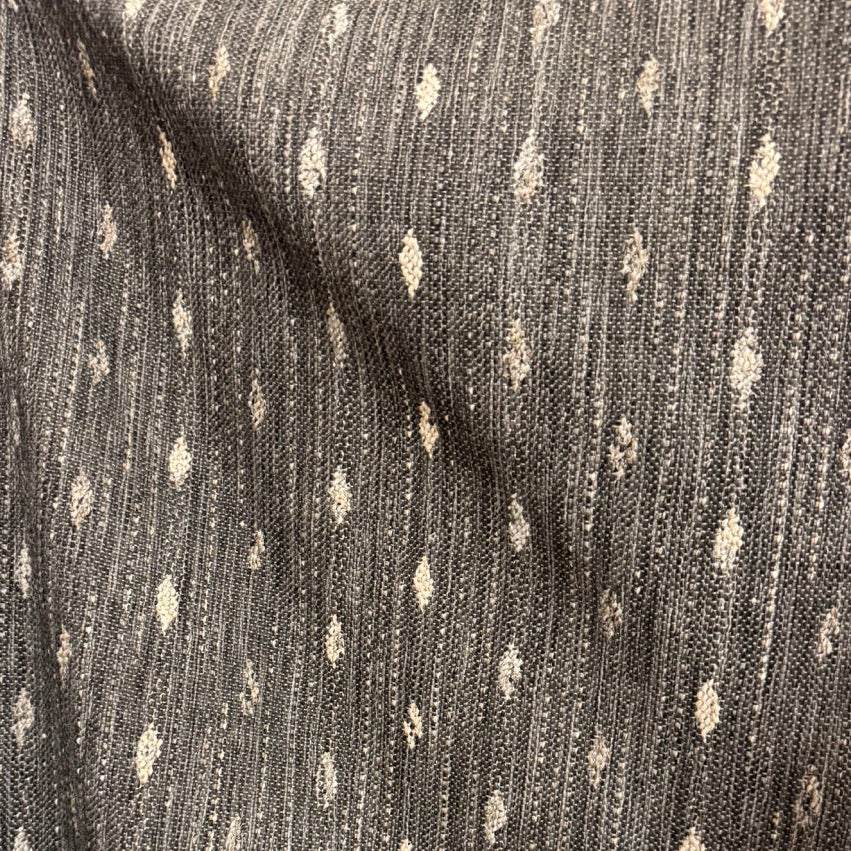 Close-up of a textured fabric with a subtle pattern
