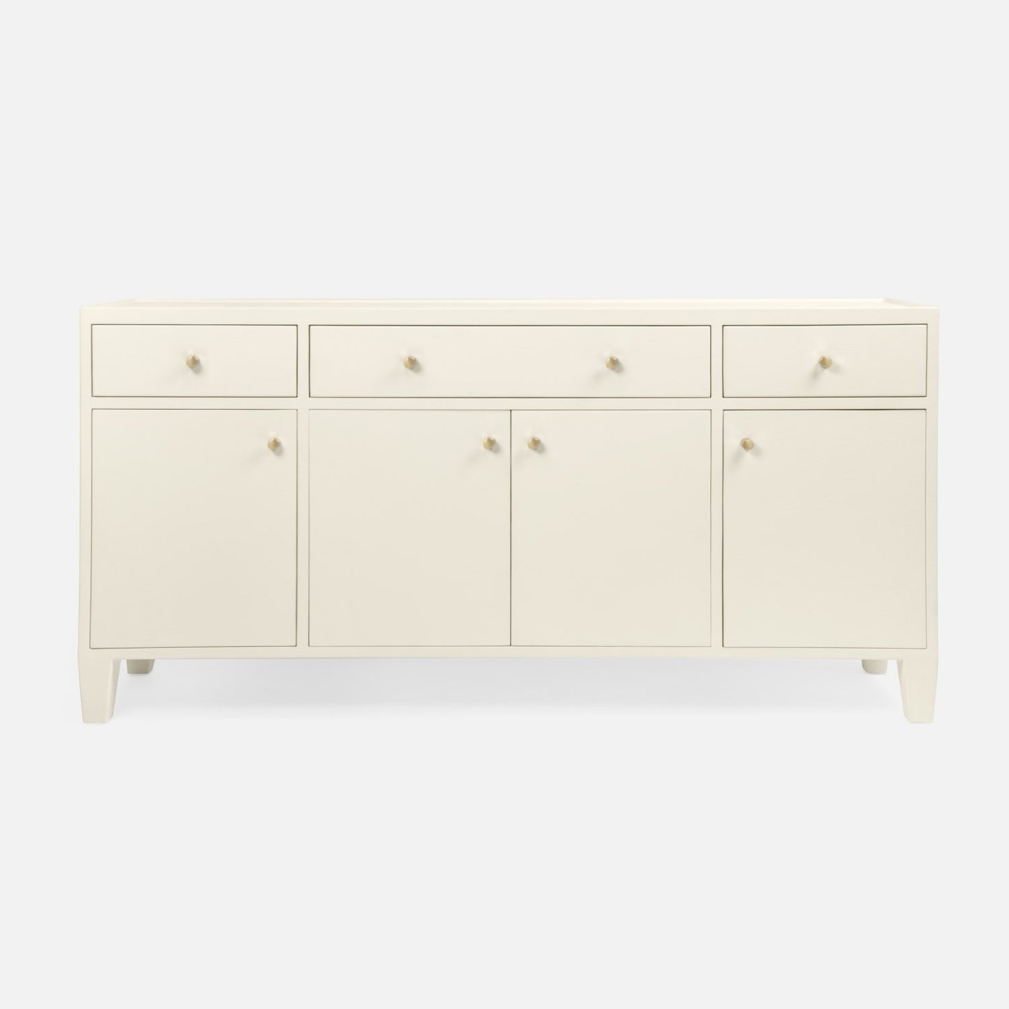 An off-white wooden sideboard or credenza with five drawers on top and three cabinet doors below, each fitted with small round metallic knobs, shown against a plain light gray background.