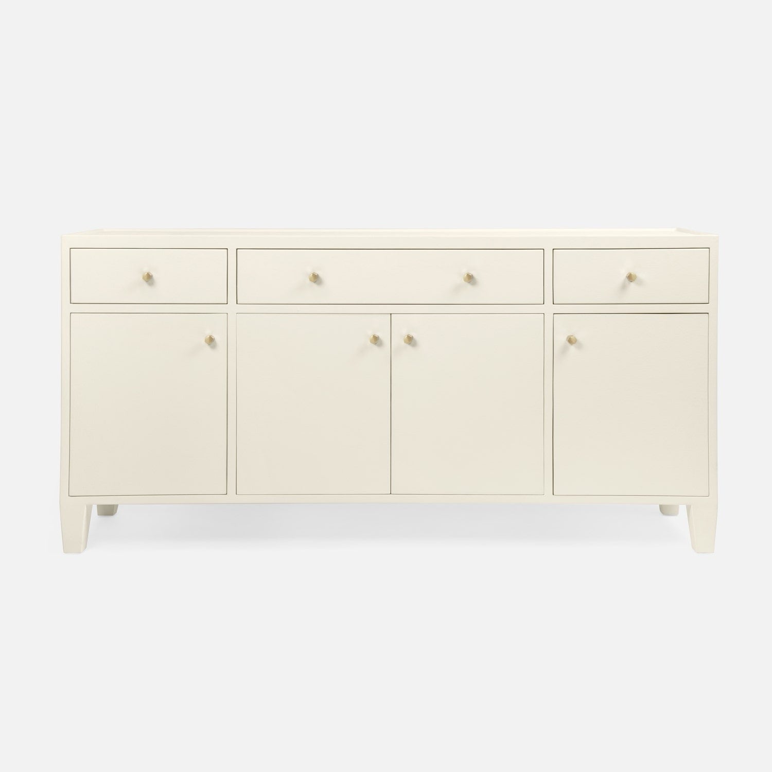An off-white wooden sideboard or credenza with five drawers on top and three cabinet doors below, each fitted with small round metallic knobs, shown against a plain light gray background.