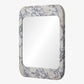 Rectangular mirror with a marble frame on a white background