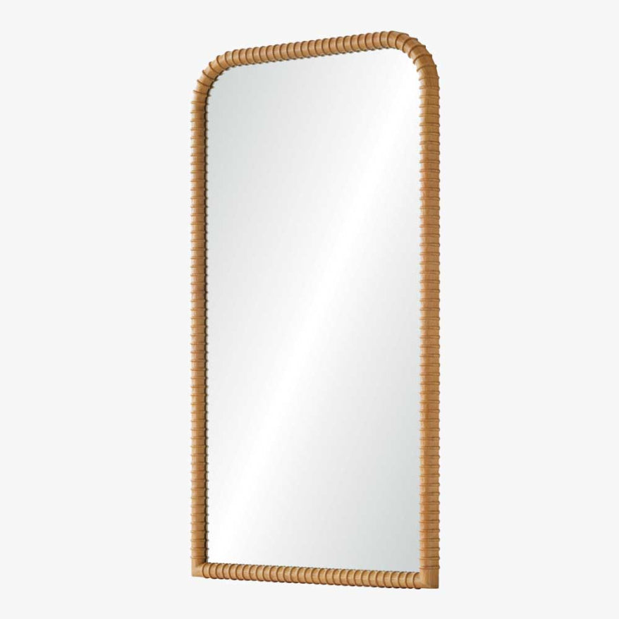 Rectangular mirror with a wicker frame on a white background