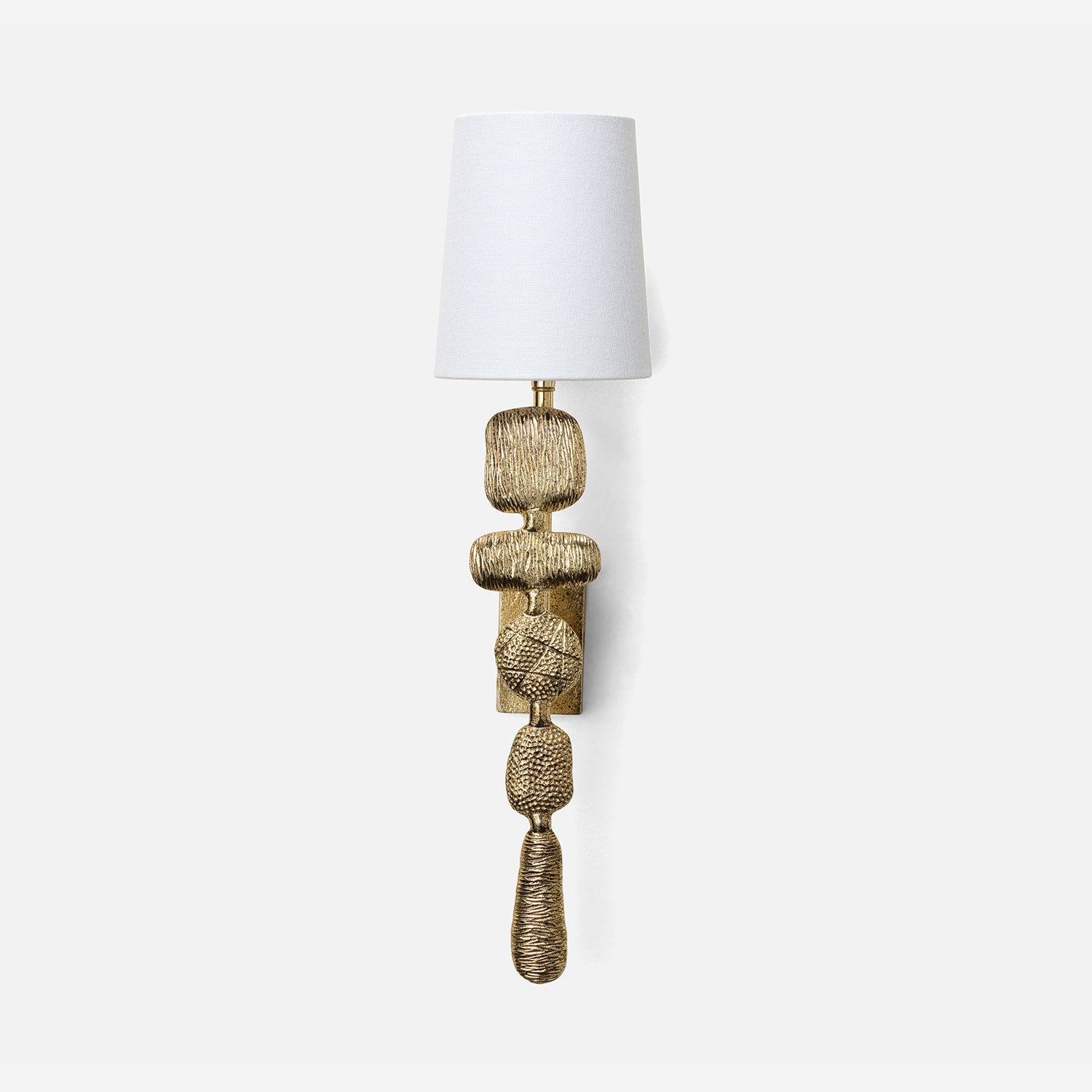 Decorative wall sconce with textured gold finish on a white background