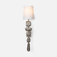Decorative wall sconce with textured design on a white background