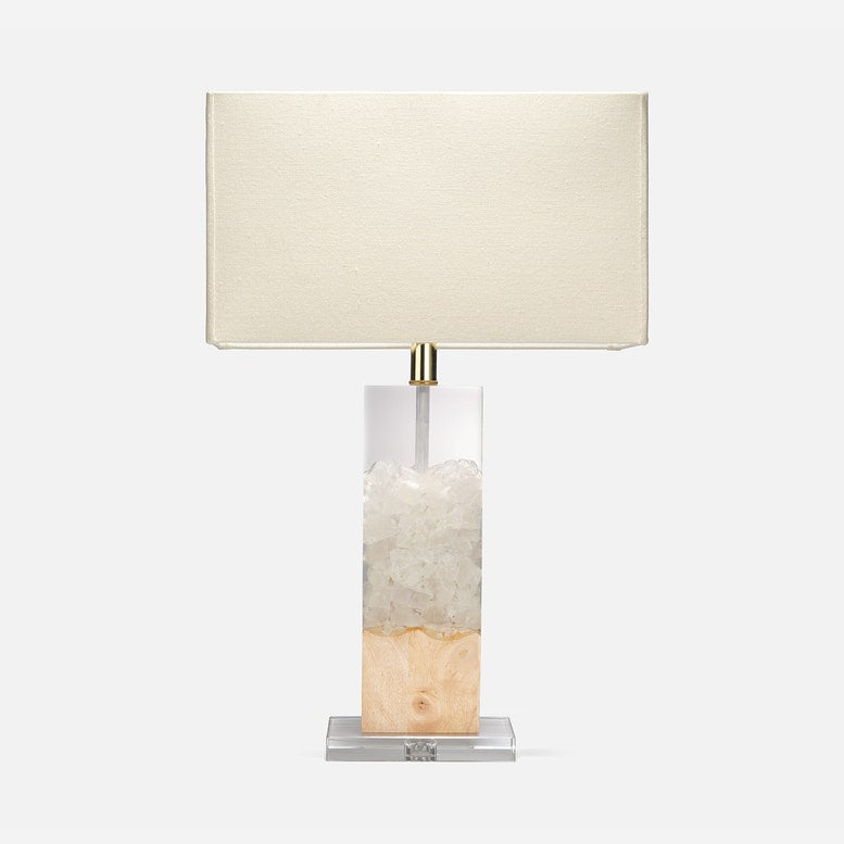 Table lamp with a rectangular base and beige shade on a white background