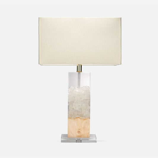 Table lamp with a rectangular base and beige shade on a white background