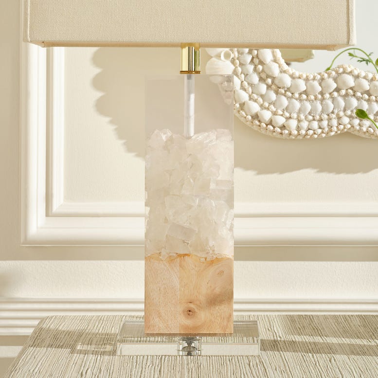 Decorative lamp with a textured base in a room setting