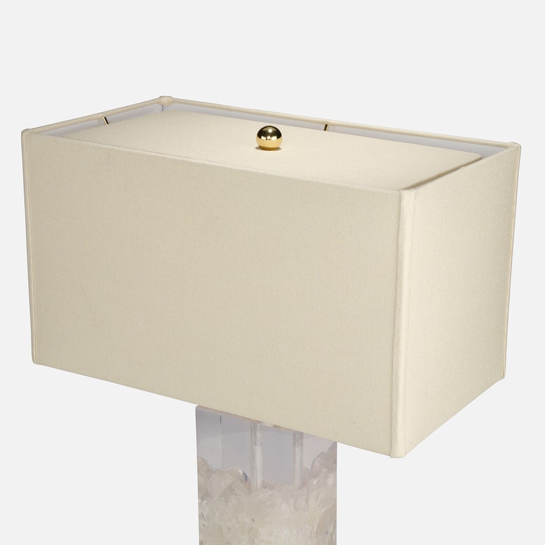 Beige table lamp with a rectangular shade on a white background