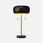 Modern black and gold table lamp on a white background
