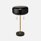 Black and gold table lamp on a white background