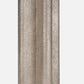 Textured neutral table lamp with a sculptural fluted base on a white background.