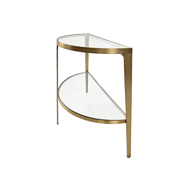 Corner glass table with gold metal frame on a white background