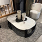 Modern coffee table with decorative items in a room setting