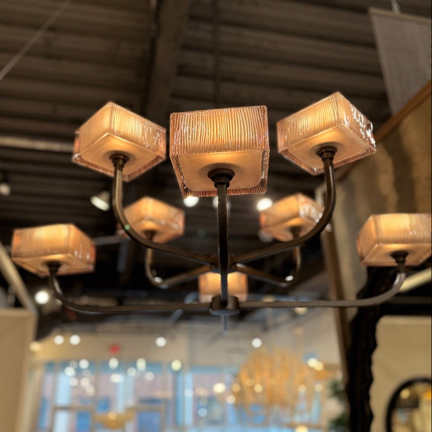 Chandelier with multiple lights in a store setting