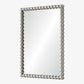 Rectangular mirror with decorative pearl-like frame on a white background