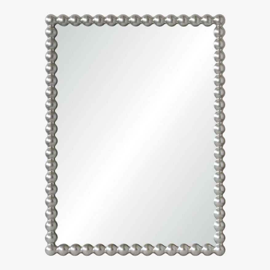 Rectangular mirror with a decorative pearl-like frame on a white background
