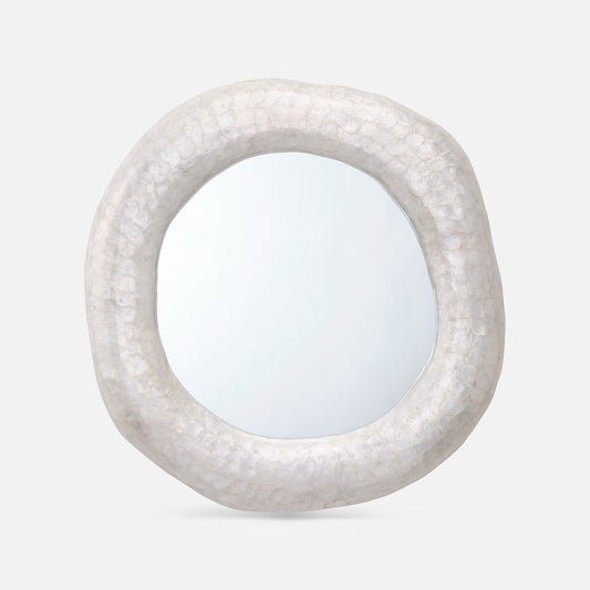 Round mirror with a textured white frame on a light gray background