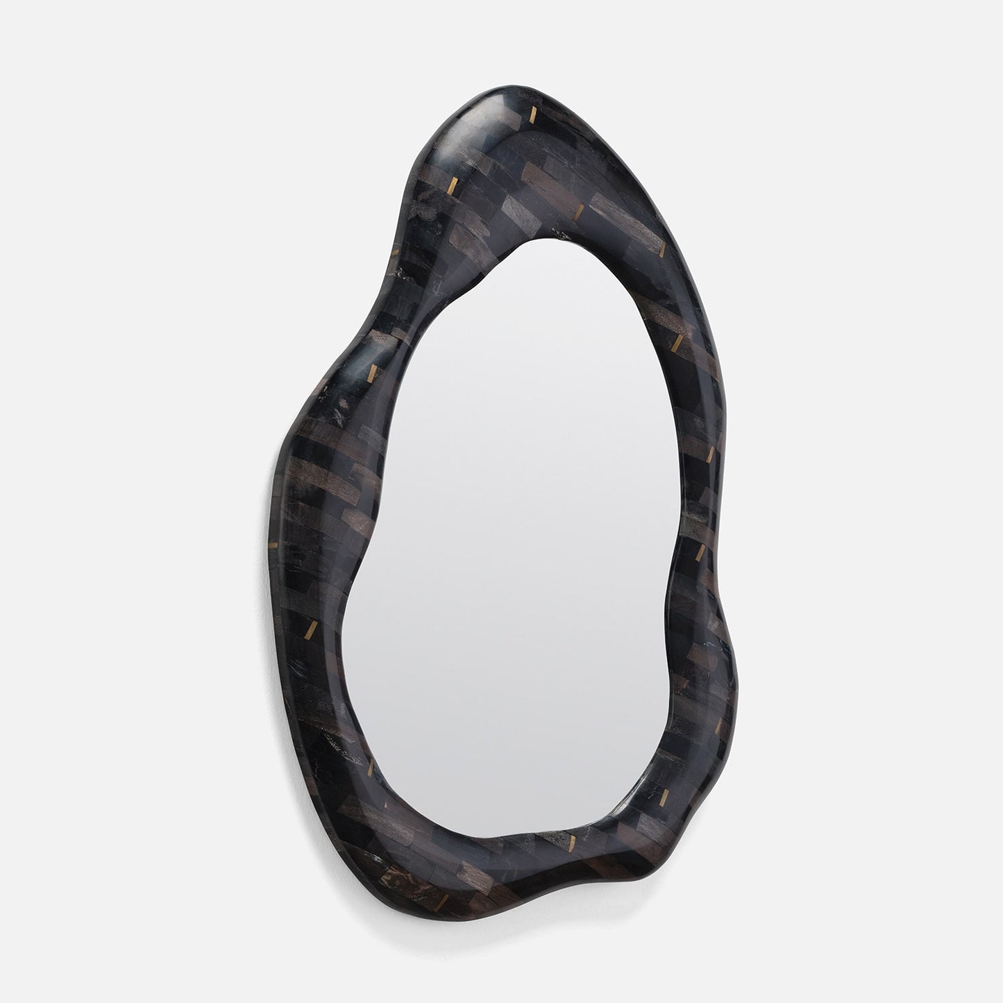 Decorative mirror with a black, wavy frame on a white background