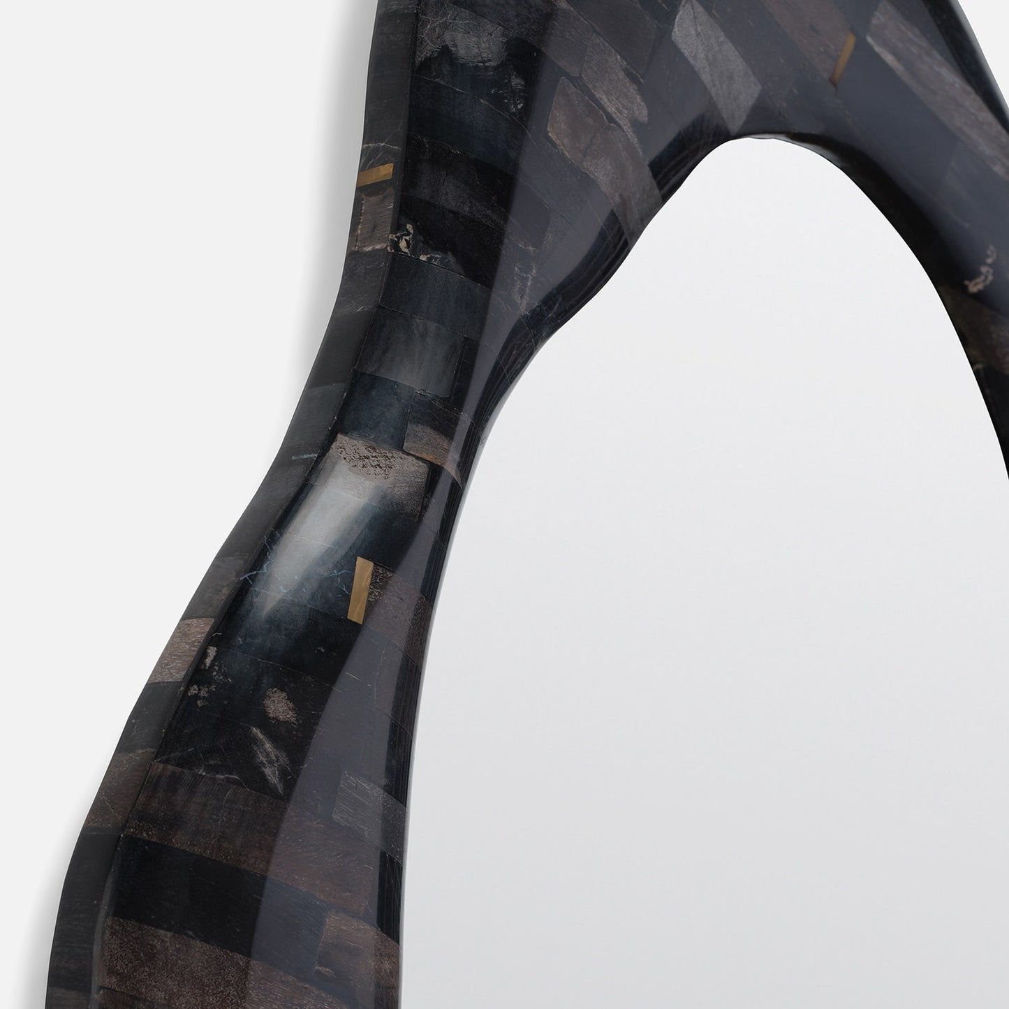 Close-up of a carbon fiber product on a white background