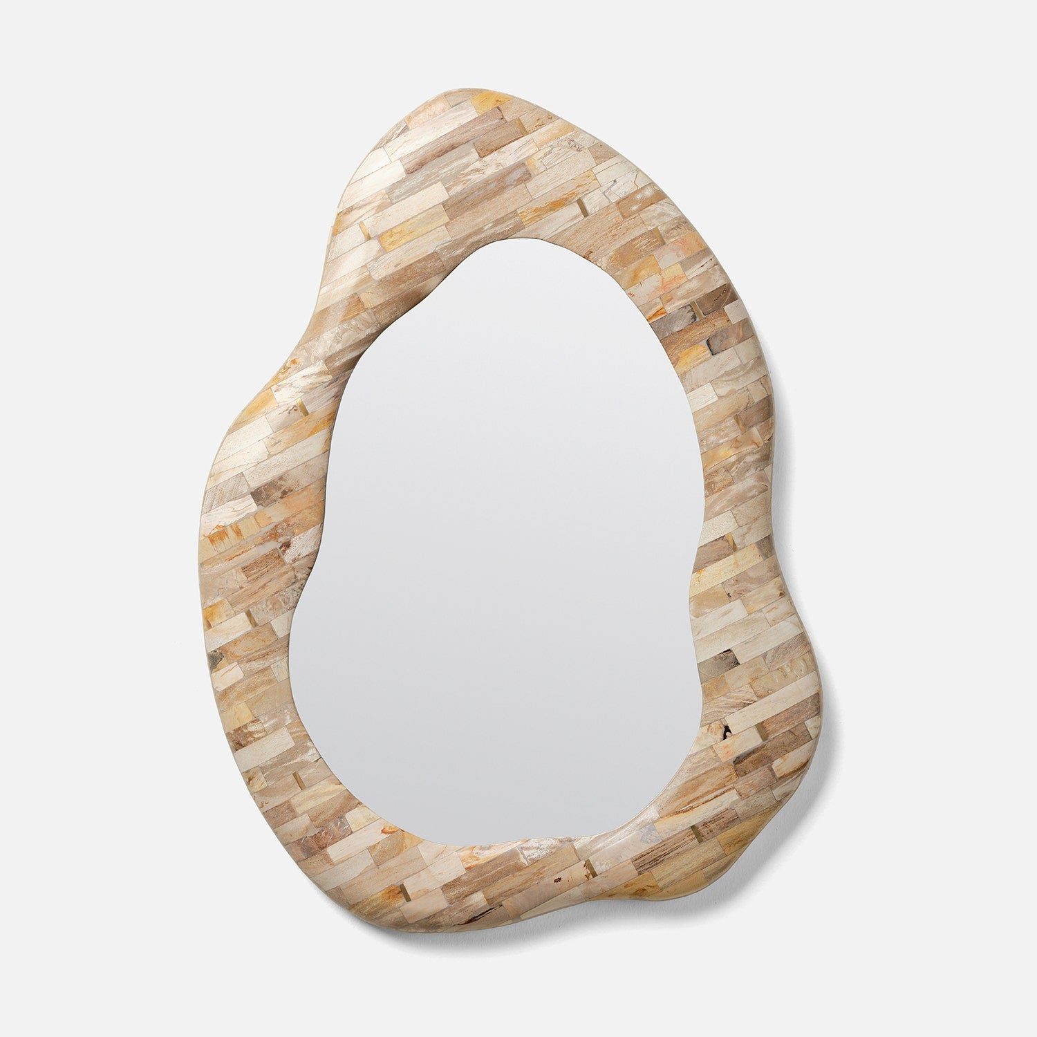 Decorative mirror with a unique, organic-shaped frame on a white background