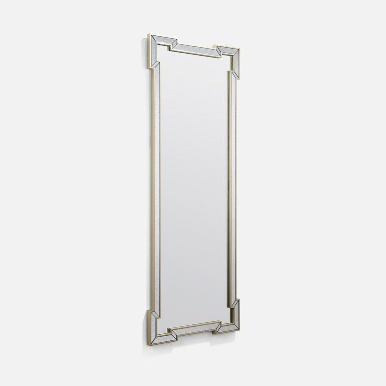 Rectangular mirror with decorative frame on a white background